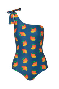 A blue one-shoulder swimsuit with a colorful mango pattern, featuring vivid orange and green mango illustrations. The strap ties into a bow at the shoulder.