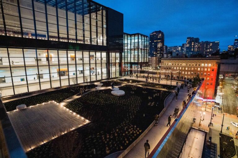 Seattle Convention Center Garden Terrace at night with illuminated walkways.