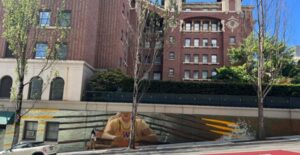 Mural of a rower wearing a University of Washington jersey.