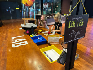 Two girls learn through play at the interactive Idea Lab at MOHAI.