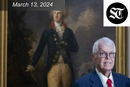 An elderly man in a suit and tie stands in front of a historical painting of a man in 18th-century attire. The date 