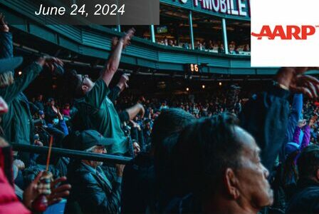 Man jumps up and down in the stands of T-Mobile Park.