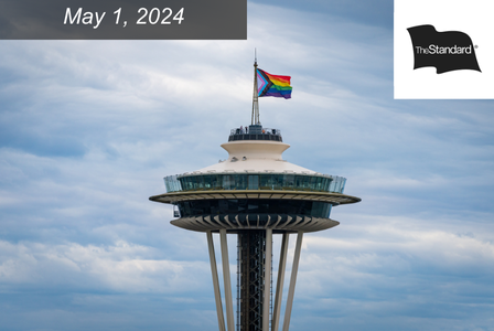 Pride flag on top of Seattle's Space Needle blows in the wind