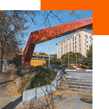 An orange sculpture at Hing Hay Park in the CID