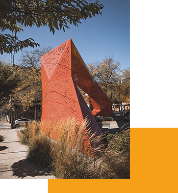 Orange sculpture at Hing Hay Park in the CID