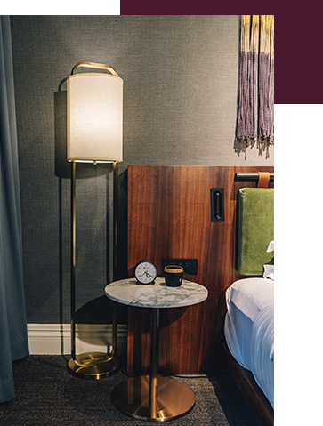Interior shot of bedside at Kobe Terrace