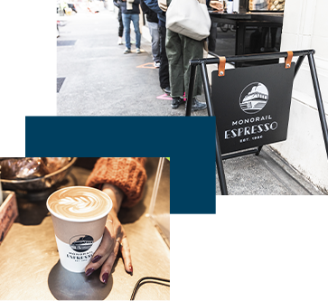 A craft latte and signage at Monorail Espresso